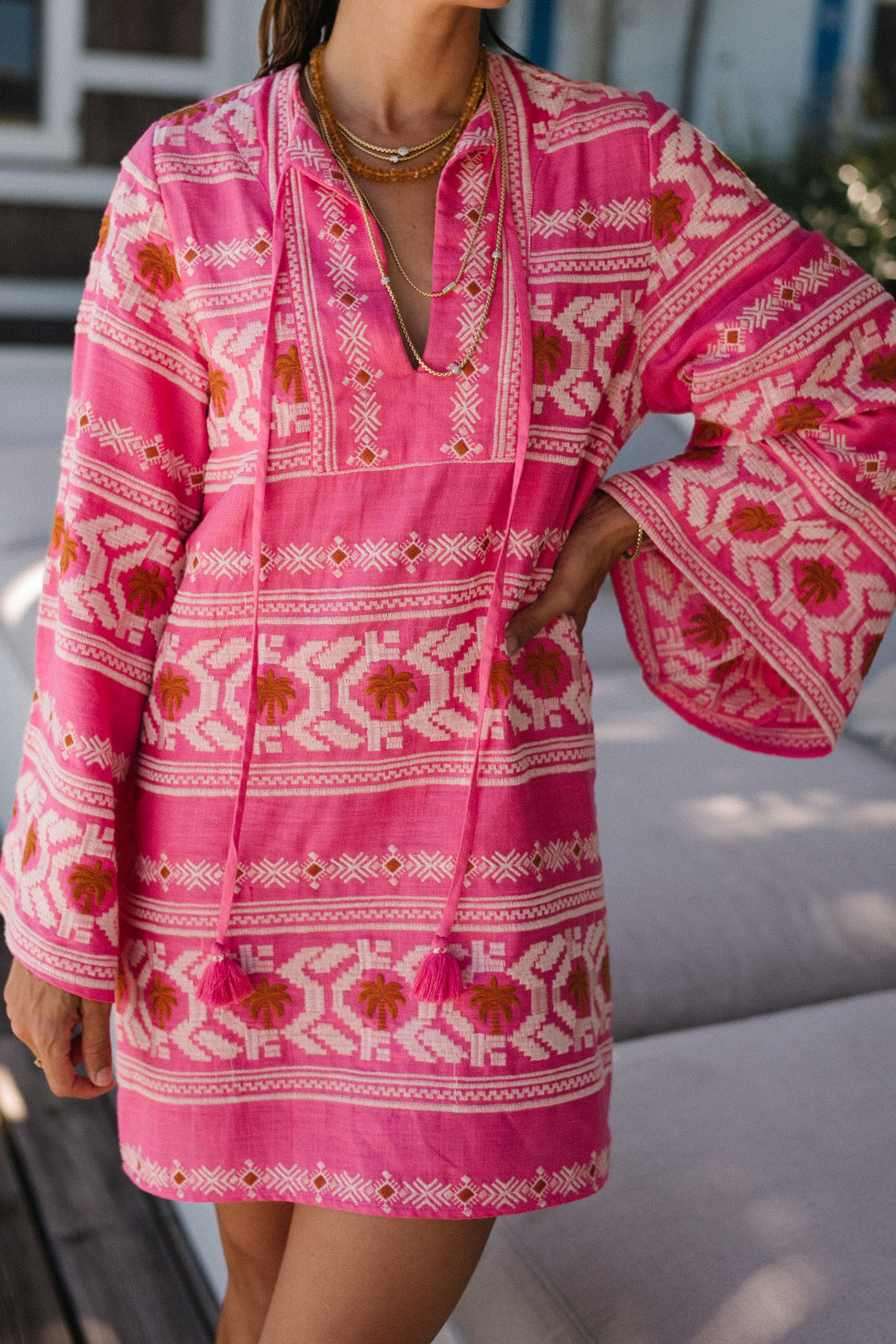 pink embroidered long sleeve mini dress