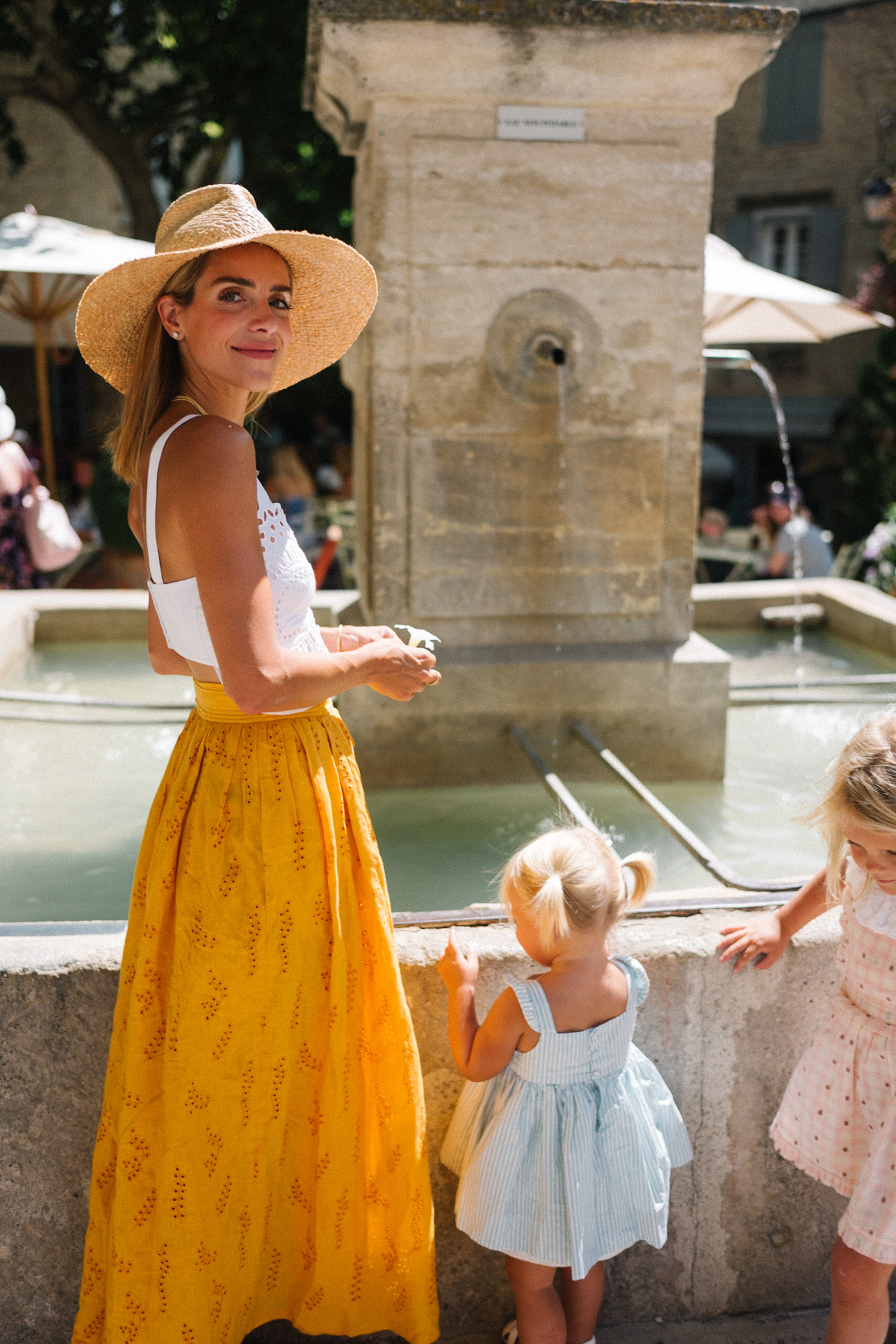 white eyelet top gold skirt straw hat