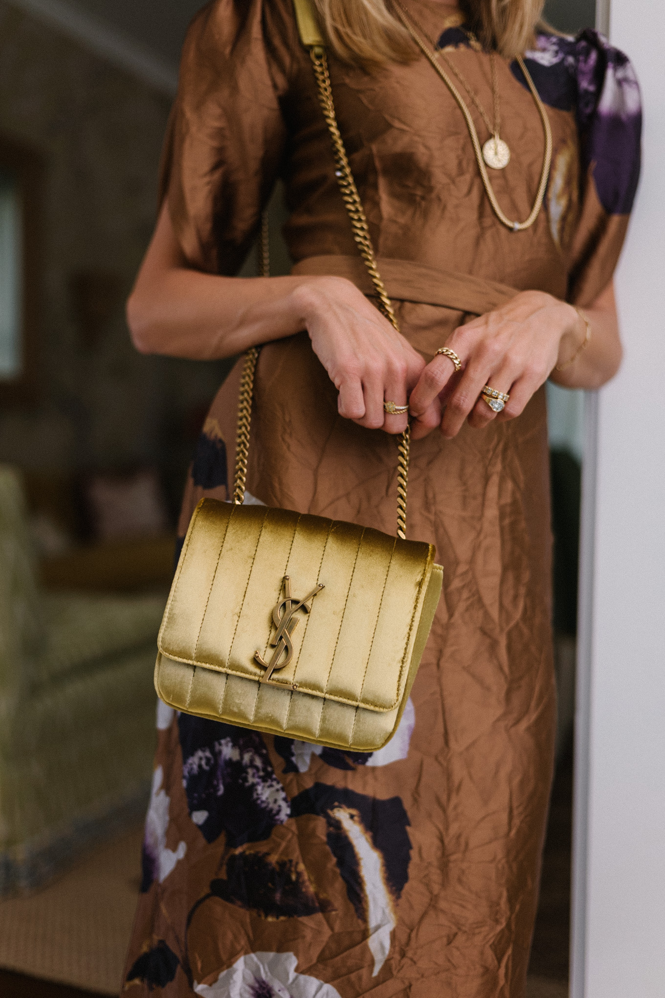 brown sleeved dress gold bag