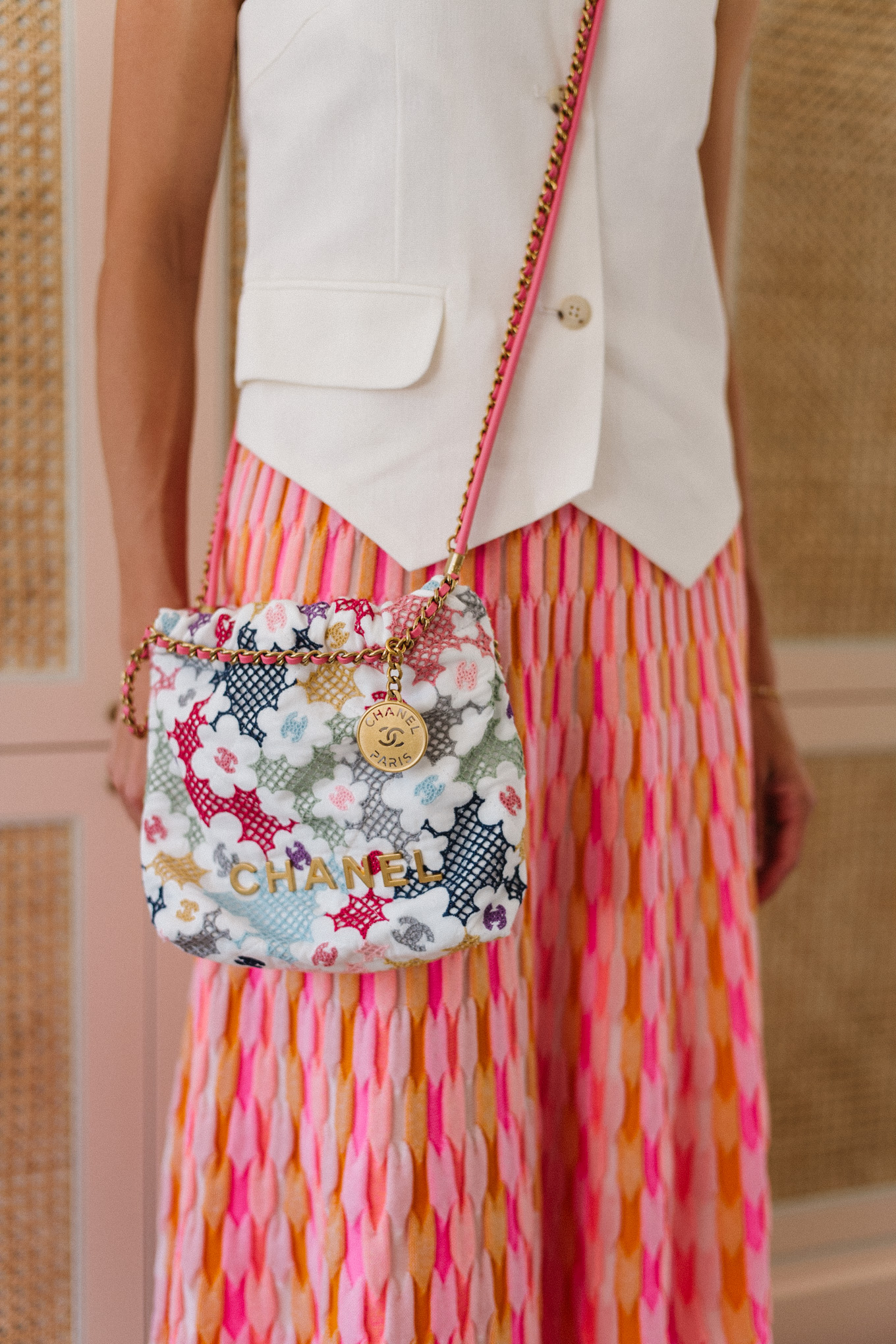 white vest top pink midi skirt